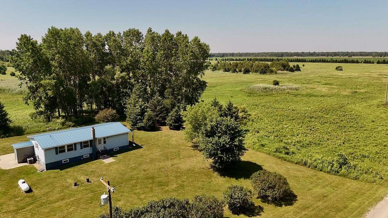 93.1 Acres of Recreational Land with Home for Sale in Turner, Michigan