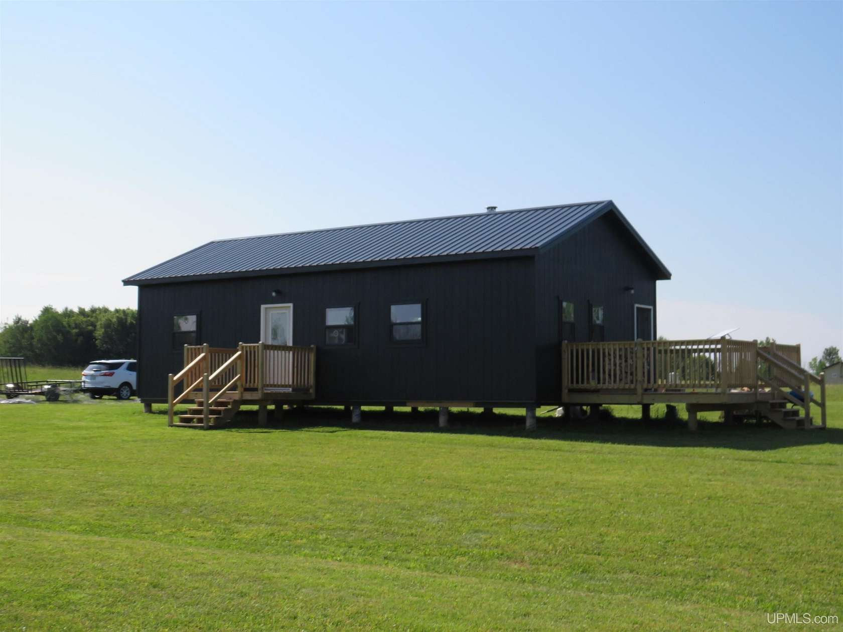 5 Acres of Land with Home for Sale in Pelkie, Michigan