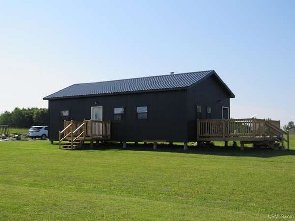 5 Acres of Land with Home for Sale in Pelkie, Michigan
