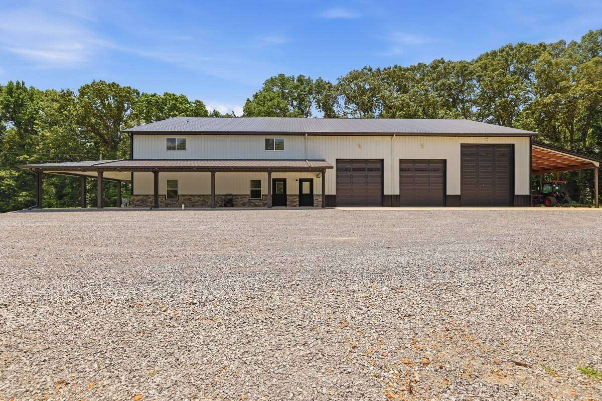 68.2 Acres of Land with Home for Sale in Hazel, Kentucky
