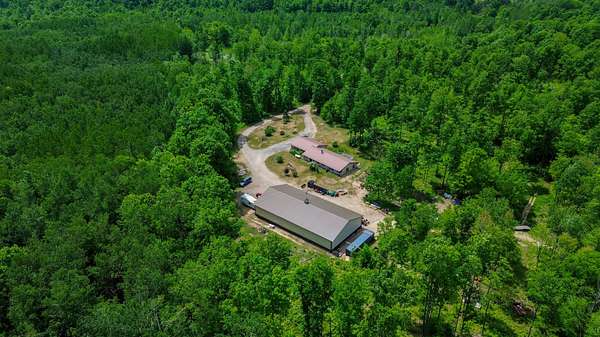 60 Acres of Recreational Land with Home for Sale in Rose City, Michigan