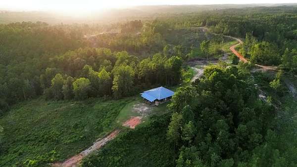 80 Acres of Recreational Land with Home for Sale in Toxey, Alabama