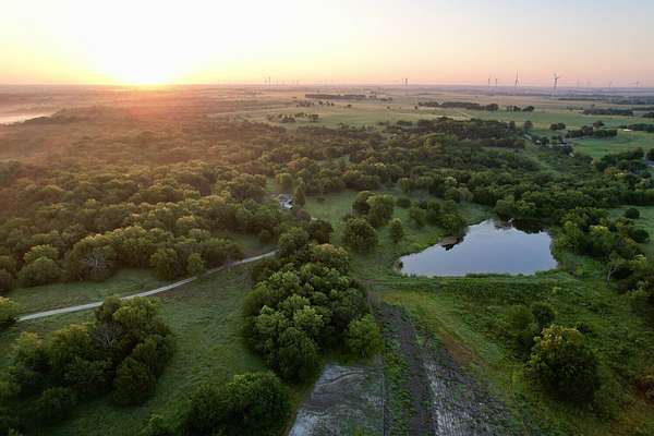 129 Acres of Land with Home for Sale in Iola, Kansas