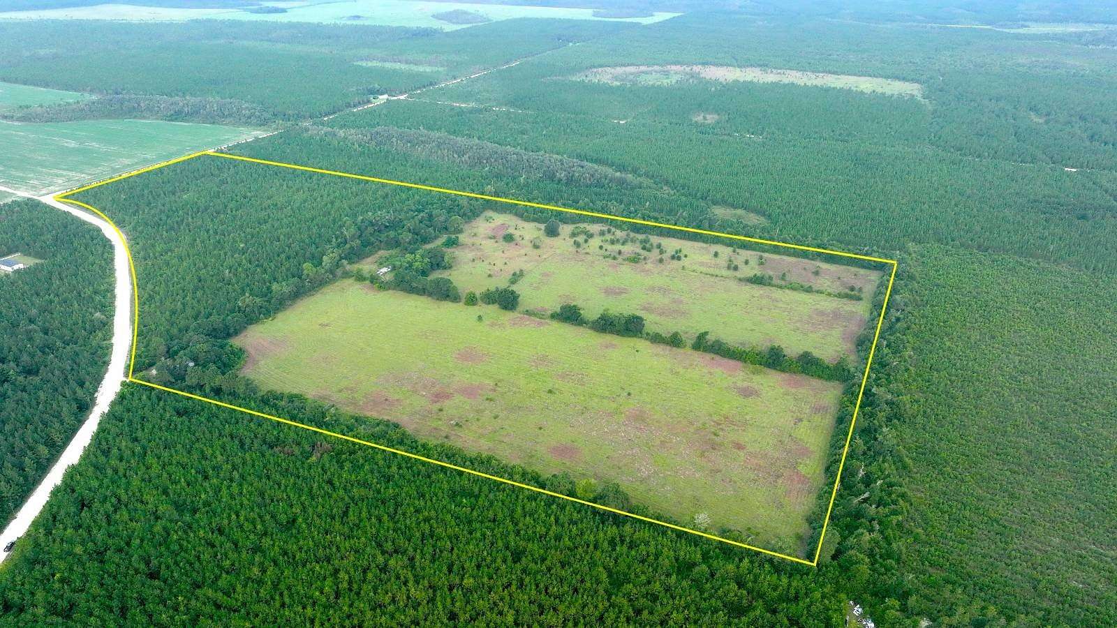 68 Acres of Recreational Land with Home for Sale in Kinard, Florida