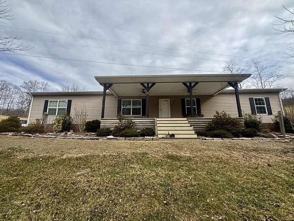 96.3 Acres of Land with Home for Sale in Eidson, Tennessee