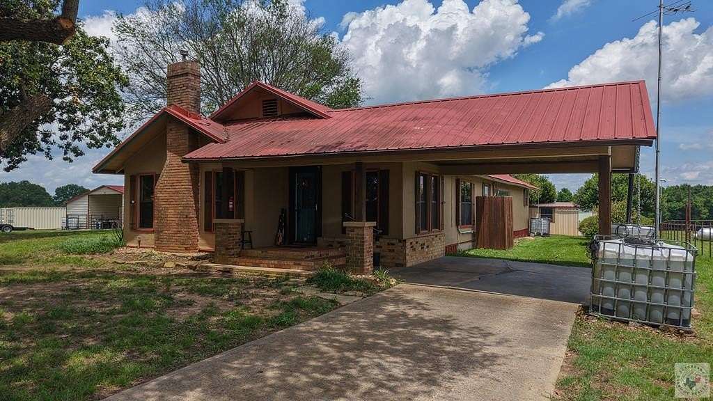 80 Acres of Land with Home for Sale in De Kalb, Texas