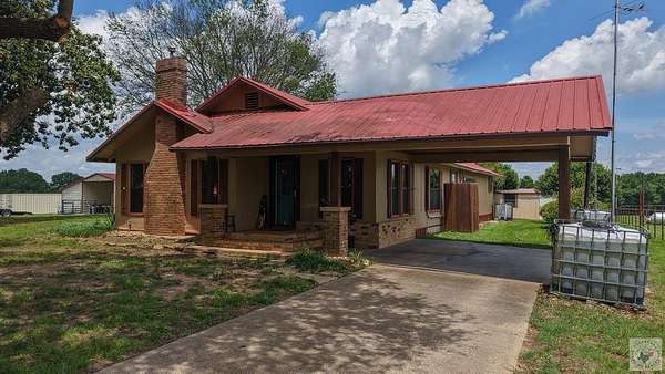 80 Acres of Land with Home for Sale in De Kalb, Texas