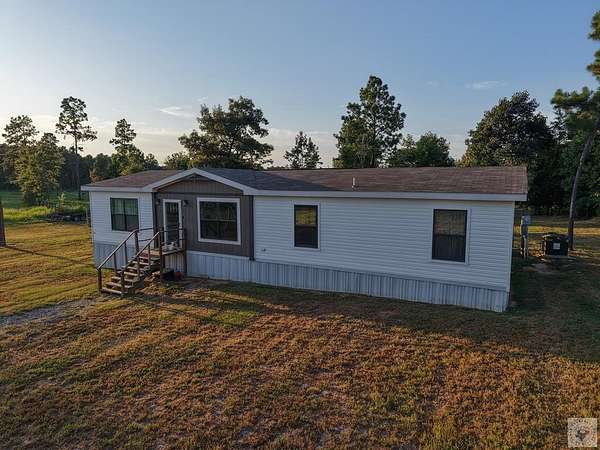 9.36 Acres of Land with Home for Sale in Bivins, Texas