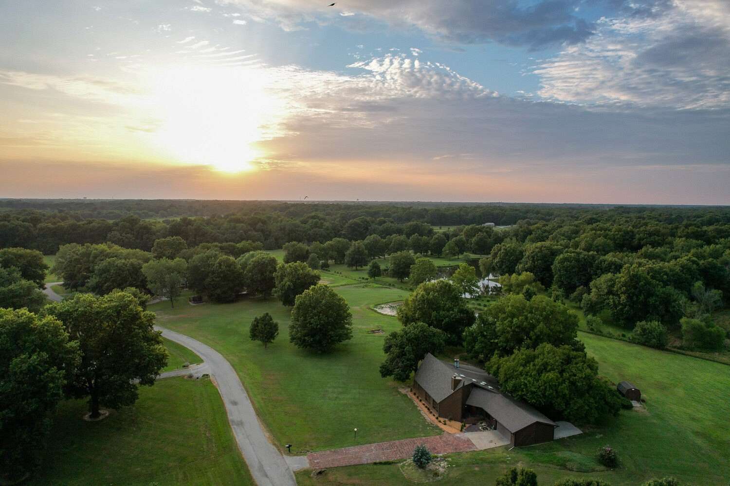 3.9 Acres of Land with Home for Sale in Pittsburg, Kansas