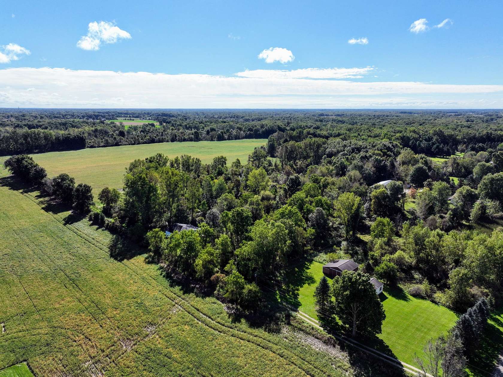 120 Acres of Land with Home for Sale in Charlotte, Michigan