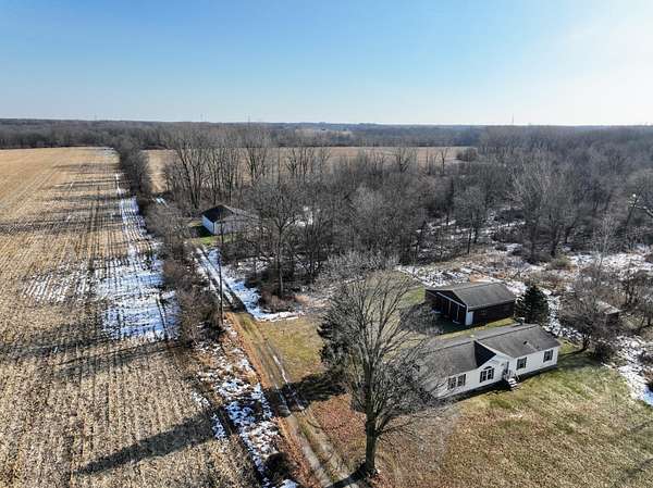 120 Acres of Land with Home for Sale in Charlotte, Michigan