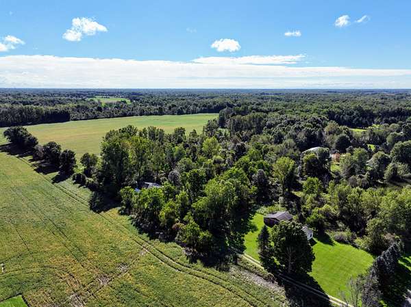 120 Acres of Land with Home for Sale in Charlotte, Michigan