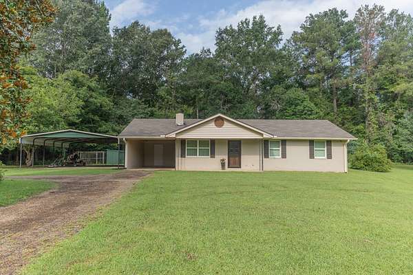 11.7 Acres of Recreational Land with Home for Sale in Vinton, Mississippi