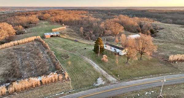 128 Acres of Recreational Land with Home for Sale in Green Castle, Missouri