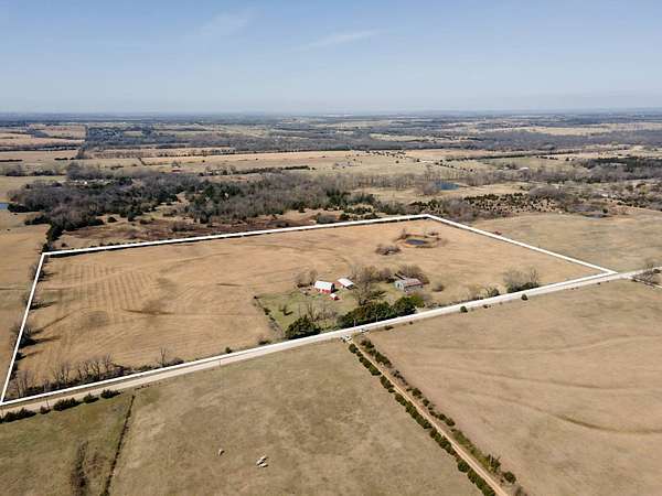 24 Acres of Agricultural Land with Home for Sale in Coffeyville, Kansas