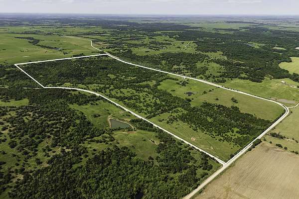 265 Acres of Land with Home for Sale in Longton, Kansas