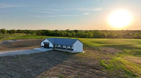 222 Acres of Recreational Land with Home for Sale in Princeton, Missouri