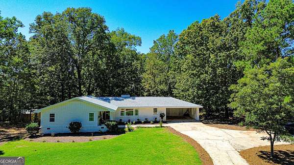 2.6 Acres of Land with Home for Sale in Chattahoochee Hills, Georgia