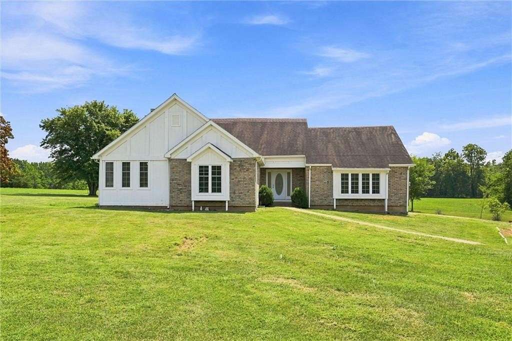 20 Acres of Recreational Land with Home for Sale in Garden City, Missouri