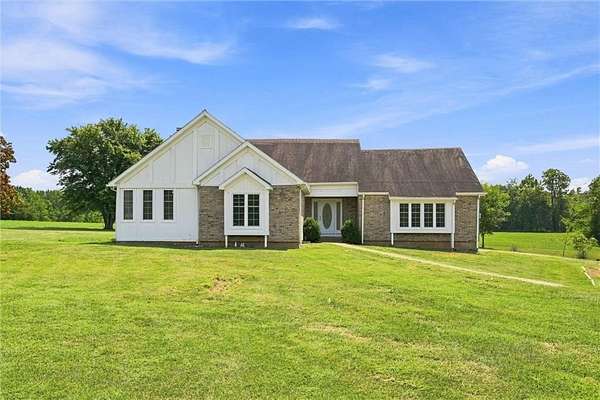 20 Acres of Recreational Land with Home for Sale in Garden City, Missouri