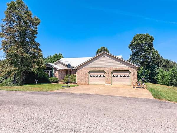7.79 Acres of Land with Home for Sale in Nebo, Kentucky