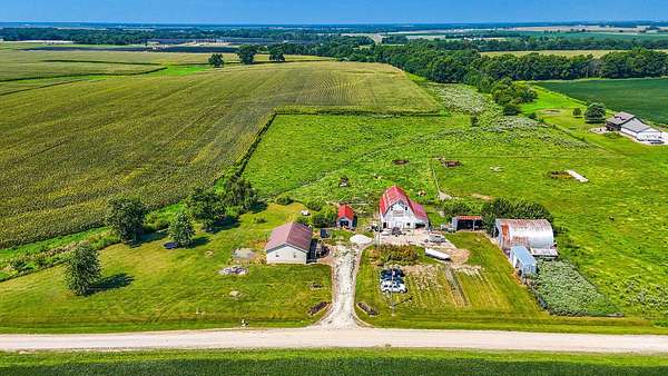 10.8 Acres of Land with Home for Sale in Vandalia, Missouri
