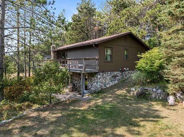 5 Acres of Land with Home for Sale in Charlevoix, Michigan