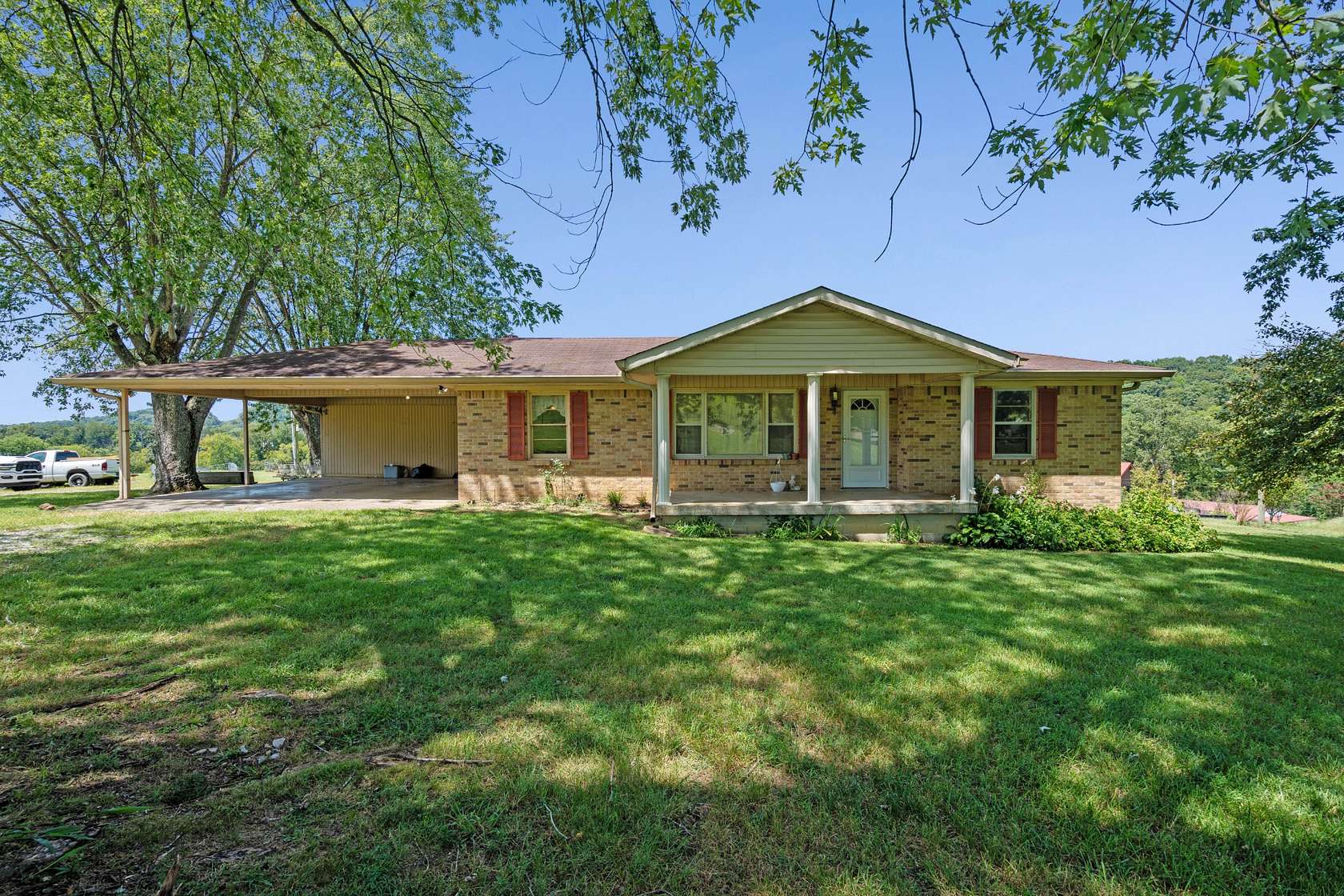 17.7 Acres of Land with Home for Auction in Elmwood, Tennessee