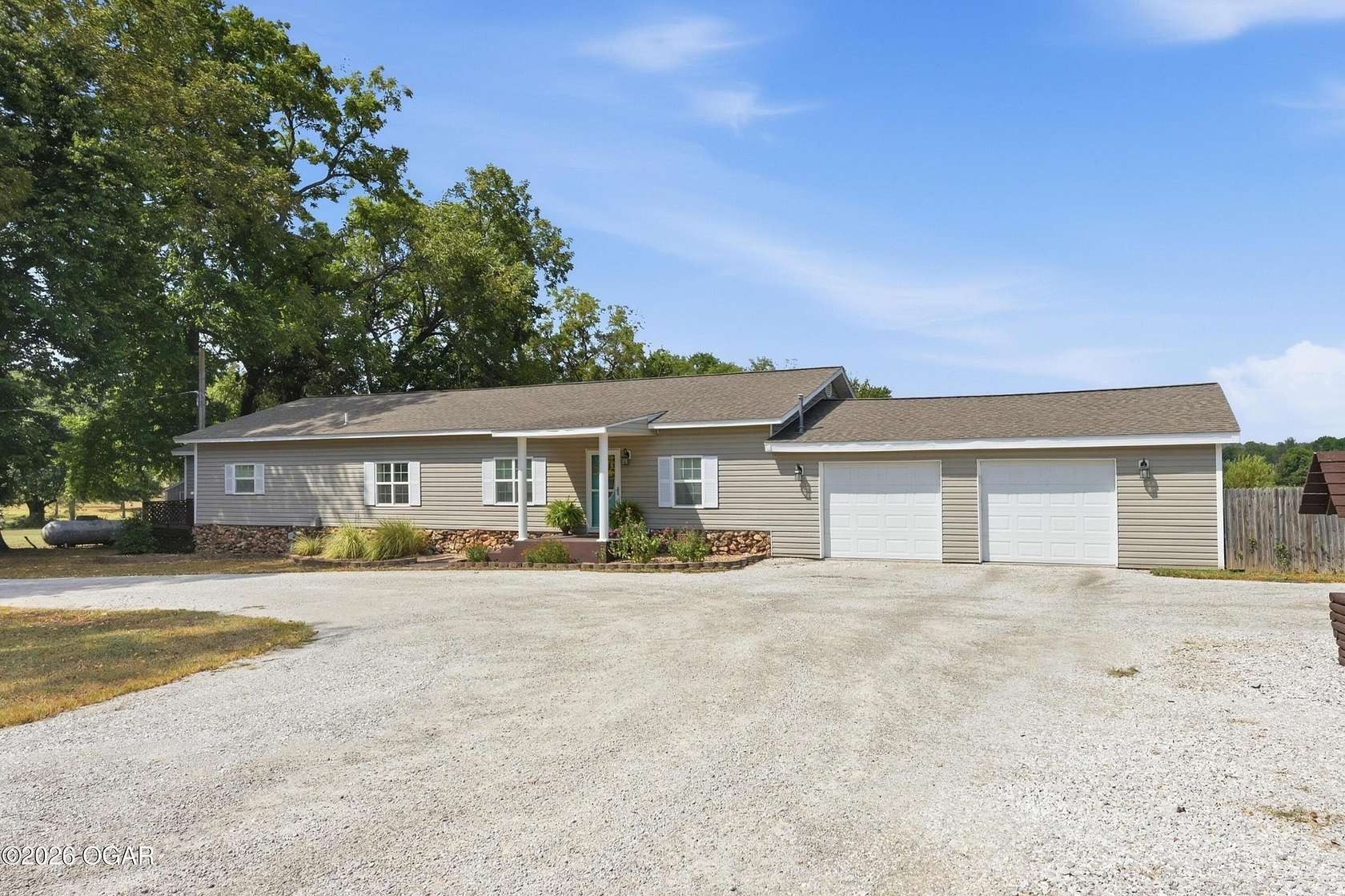 4.77 Acres of Land with Home for Sale in Carthage, Missouri