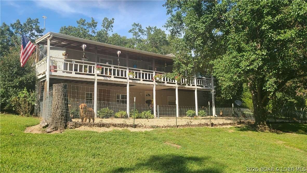 8.15 Acres of Land with Home for Sale in Versailles, Missouri