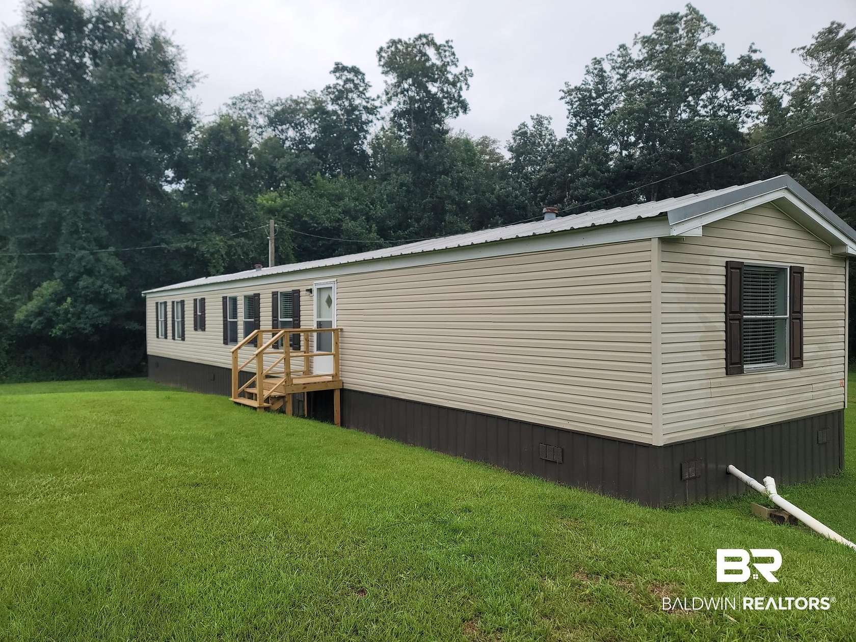 6.2 Acres of Land with Home for Lease in Summerdale, Alabama
