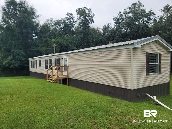 6.2 Acres of Land with Home for Lease in Summerdale, Alabama