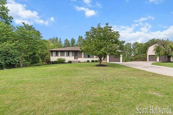 5.3 Acres of Land with Home for Sale in Byron Center, Michigan