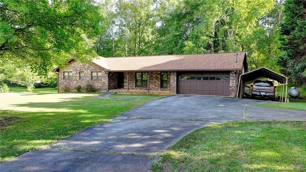 6 Acres of Land with Home for Sale in Johns Creek, Georgia