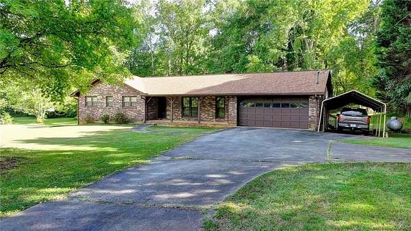 6 Acres of Land with Home for Sale in Johns Creek, Georgia
