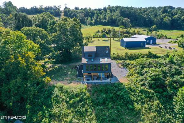 81.5 Acres of Land with Home for Sale in Harrogate, Tennessee