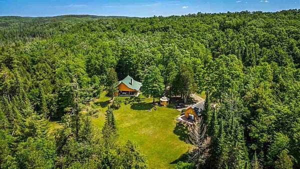412 Acres of Recreational Land with Home for Sale in Vanderbilt, Michigan
