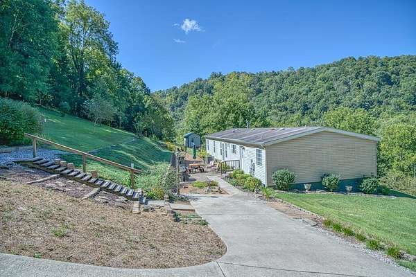 25.1 Acres of Land with Home for Sale in Celina, Tennessee