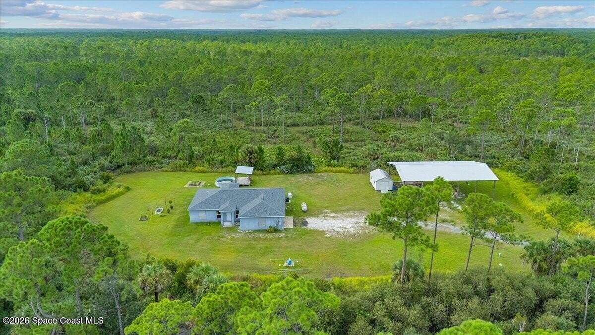 3.1 Acres of Land with Home for Lease in Grant-Valkaria, Florida