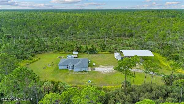 3.1 Acres of Land with Home for Lease in Grant-Valkaria, Florida