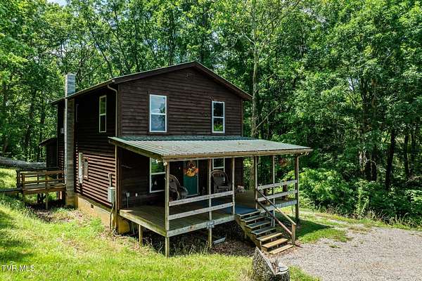 31.1 Acres of Recreational Land with Home for Sale in Mountain City, Tennessee