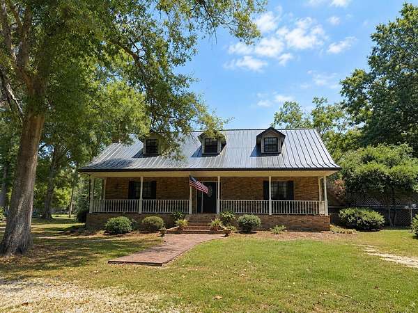 34.4 Acres of Land with Home for Sale in Columbia, Mississippi