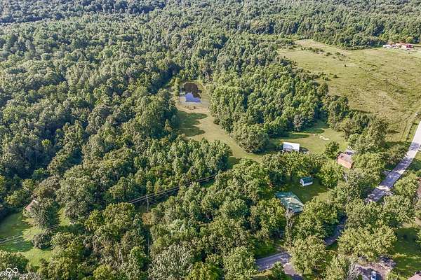 5 Acres of Land with Home for Sale in Trafalgar, Indiana