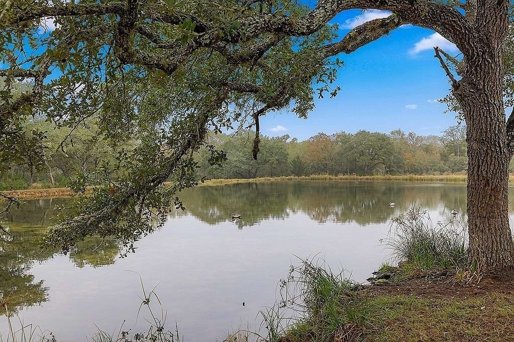 59 Acres of Agricultural Land with Home for Sale in Sheridan, Texas