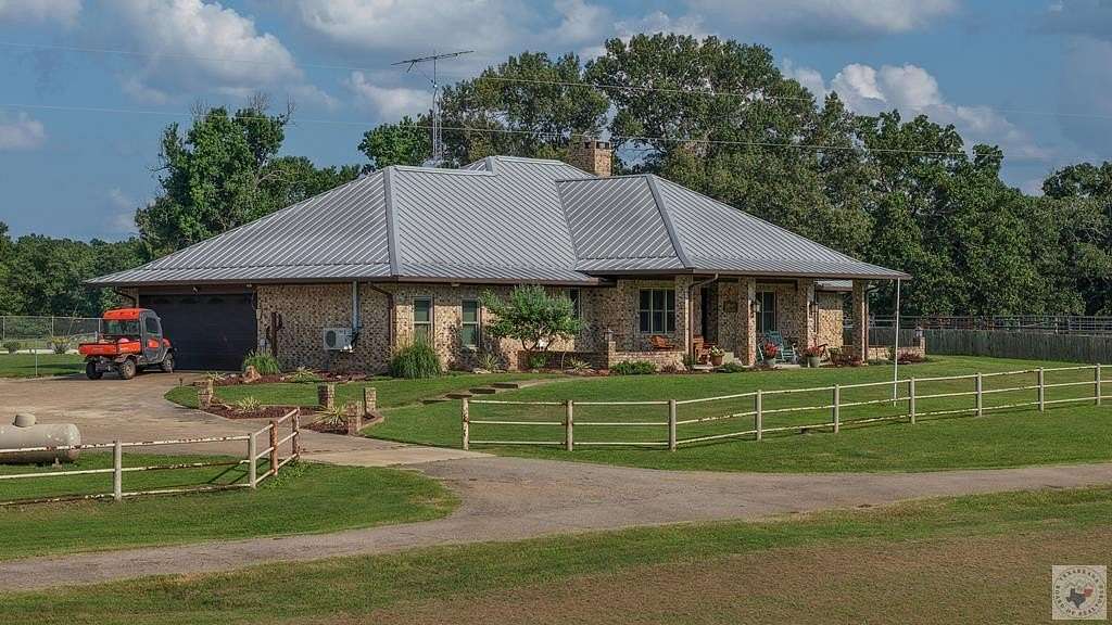 161 Acres of Land with Home for Sale in Cookville, Texas