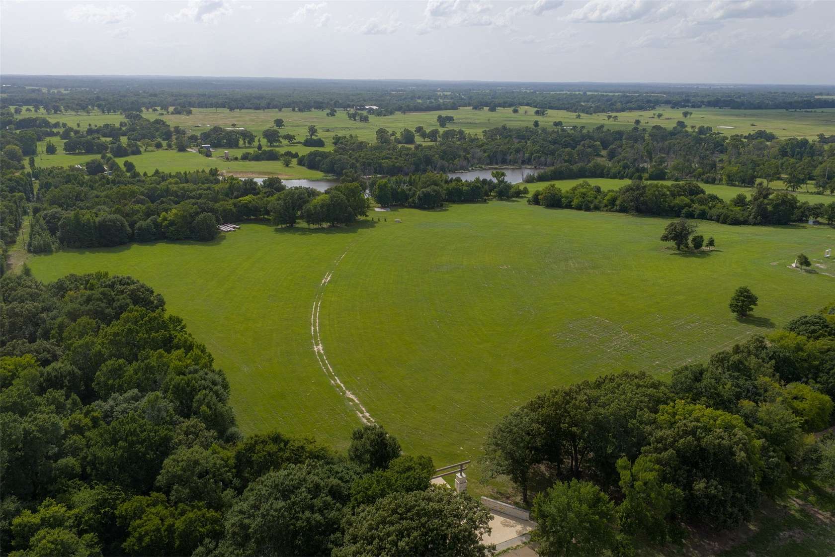 129 Acres of Recreational Land with Home for Sale in Murchison, Texas