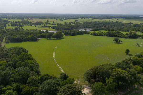 129 Acres of Recreational Land with Home for Sale in Murchison, Texas