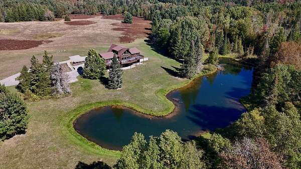 120 Acres of Land with Home for Sale in Tustin, Michigan