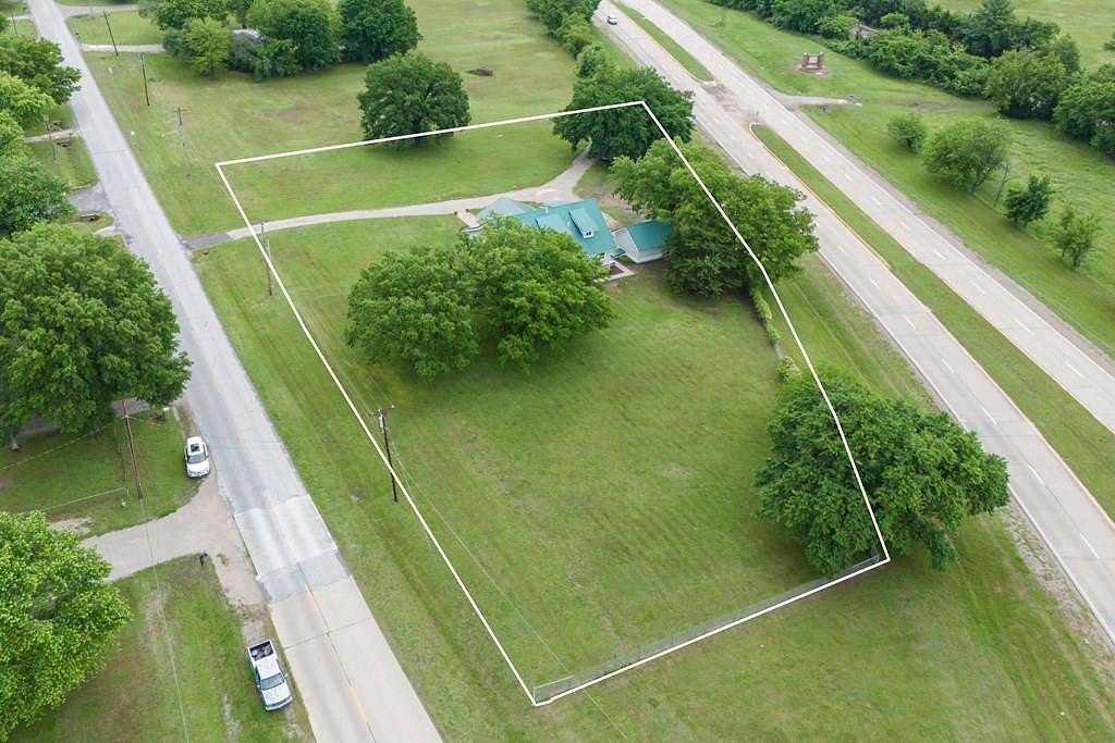 1.6 Acres of Land with Home for Sale in Coffeyville, Kansas