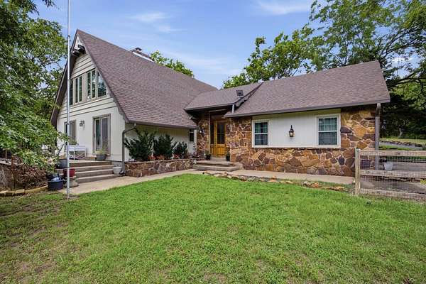 16.7 Acres of Land with Home for Sale in Coffeyville, Kansas